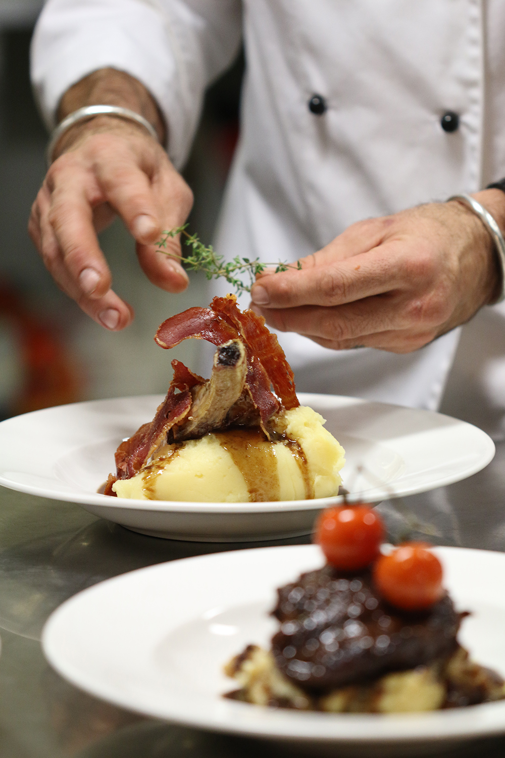 Chef plating veal cutlet low res.jpg