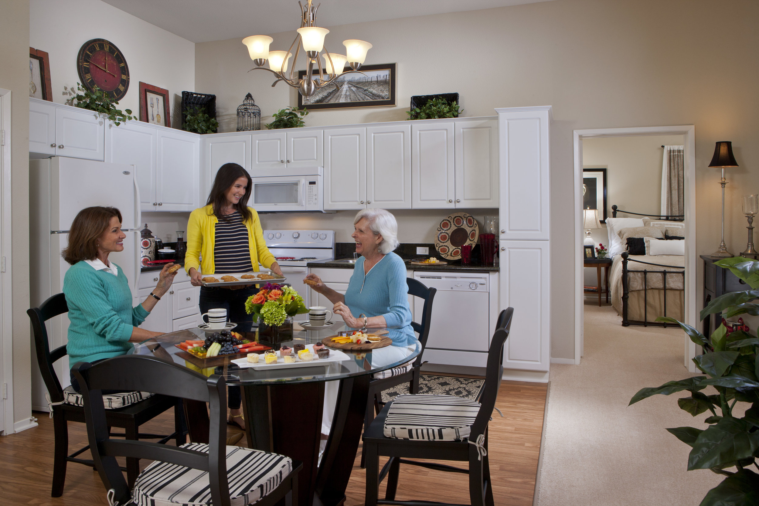 1153-20_Apt-Kitchen-women_Monarch_Village_San-Francisco_ASL.jpg