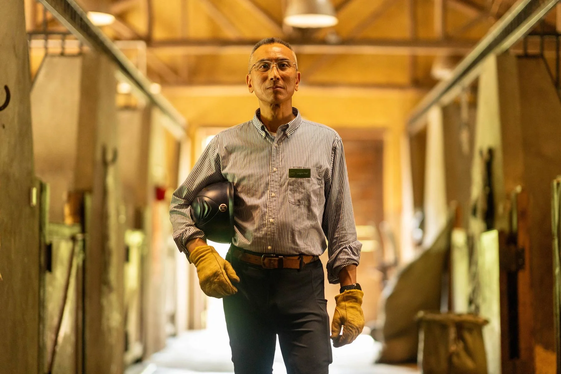 Logos Hall, chief equestrian trainer at Naked Stable in Huzhou, China photographed for the Financial Times