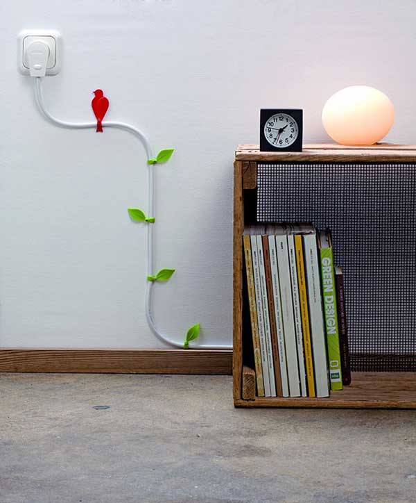 Why bother trying to hide those wires... make a feature instead.