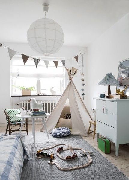 It's easy to make a kid's room fun, though why not make the teepee adult sized?! 