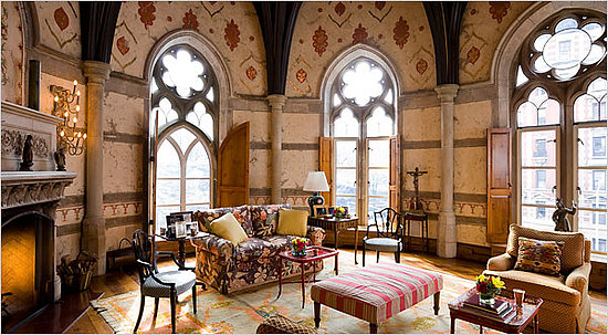 This living room is full of character. The windows and painted walls take centre stage.