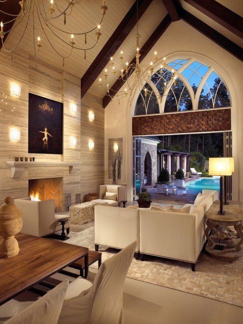 Look at those gorgeous windows! A sensitive conversion, with a very tempting pool.