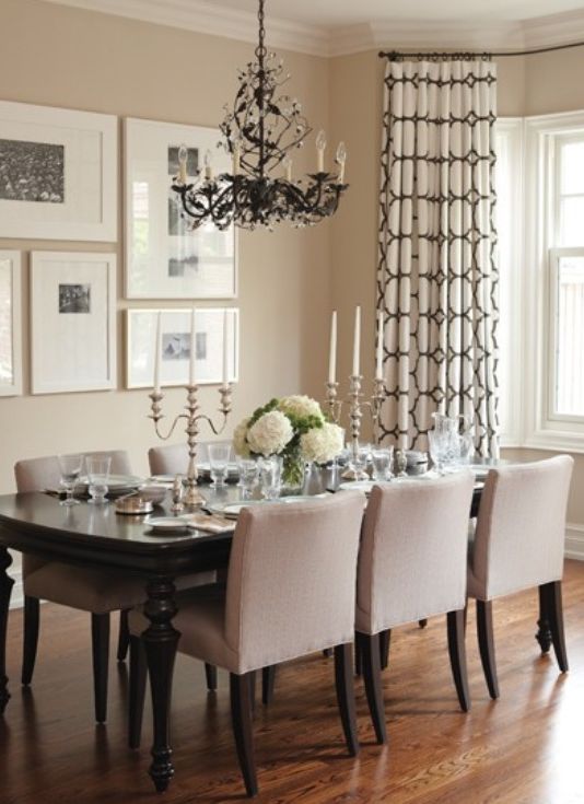 Patterned drapes fixed high will elongate your room. Keep other patterns in the room to a minimum for this trick to really work well.