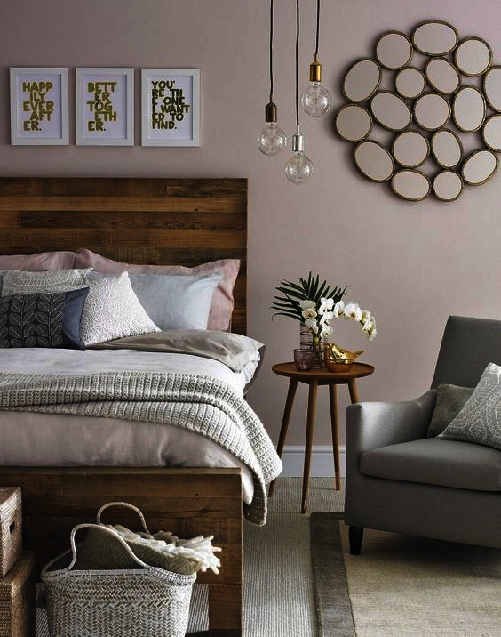 Wood can add natural warmth to a bedroom when used as a headboard.