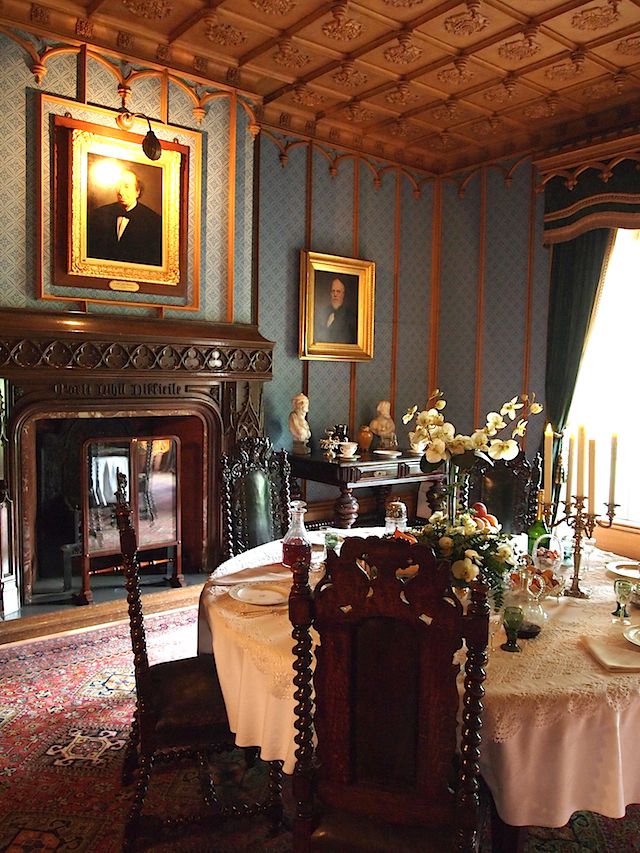 The Gothic revival in Victorian times was not the dark, forboding stereotype we envisage. Rather, it was an architectural style typified by intricately decorated churches, stained glass windows featuring complex trefoil designs, stencilled nature designs, heraldic symbols and tall arches. This dining room at Hughenden Manor shows off these Gothic features well.