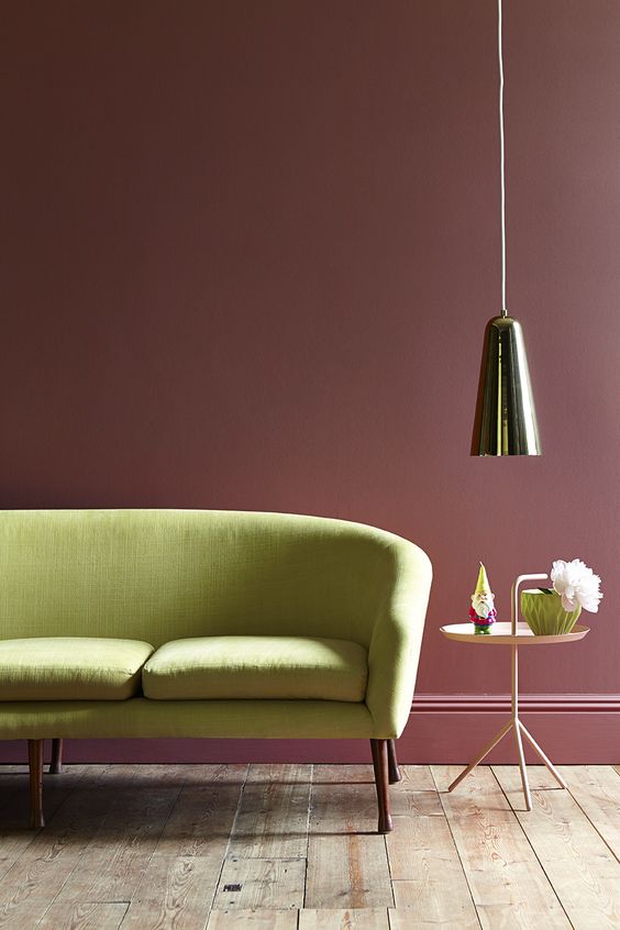 This 'Ashes of Roses' Victorian heritage paint from Little Greene brings warmth and looks fabulous behind this citron sofa. A brilliant colour scheme to bring some Victorian flair to your home.