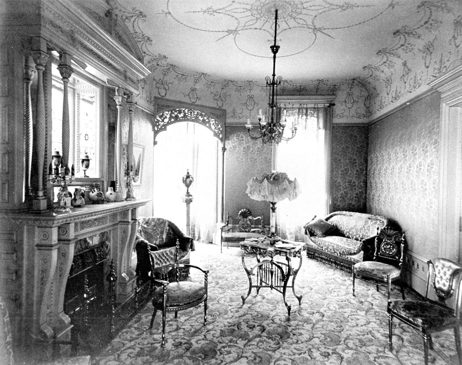 Patterns dominate this room - on the floor, the walls, ceiling and sofa!