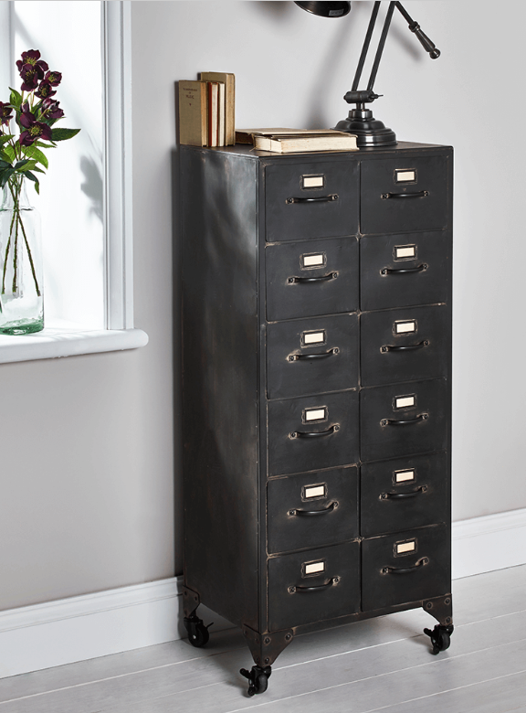 You can imagine stumbling upon this beauty in a vintage store. It looks like a snapshot of history from another era. Practical too with 12 drawers and being on wheels means you can move it into the perfect place. Source: Cox & Cox