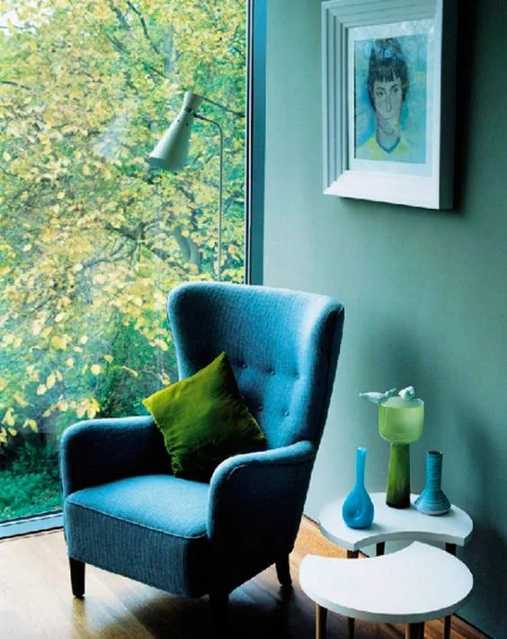 Maybe you crave more of a change? Perhaps you're ready to fully embrace Greenery and really bring the outside in... This home is lucky enough to have a window which looks straight onto greenery. Look how well it goes with the rich teals and greens inside! A warm wood floor ad white table soften the look. Picture: themakerplace.co.uk