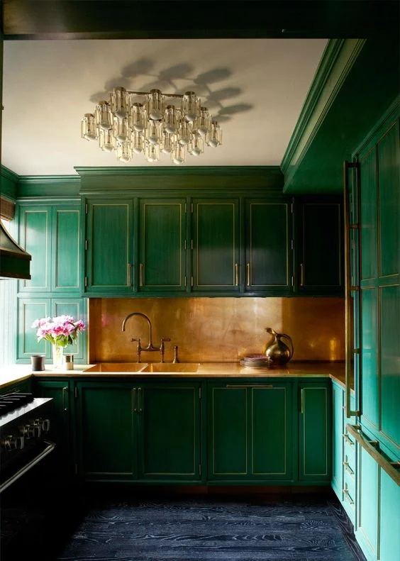 If you're especially brave, embrace this kitchen. Wow! The units are incredible. I love the copper splash back which brings light and draws your eye into the room. A dark blue floor completes the scheme. Picture: bykoket.com