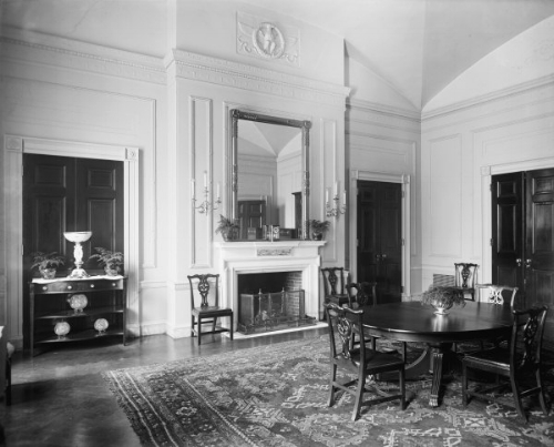 Beautifully decorated using a large oriental rug and dark furniture. The tall mirror shows off the room's high ceiling. Photo: whitehousemuseum.org
