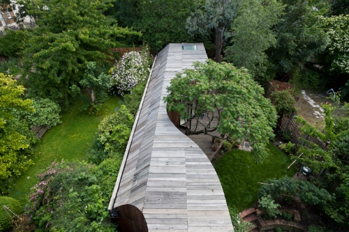 Ok, so I know this is example is a little extreme - altering your house to incorporate a tree! But, the idea of integrating your home into its surroundings is a good one. Choose your garden planting carefully and try to help your home become part of your garden and part of nature. Image: metalocus.es