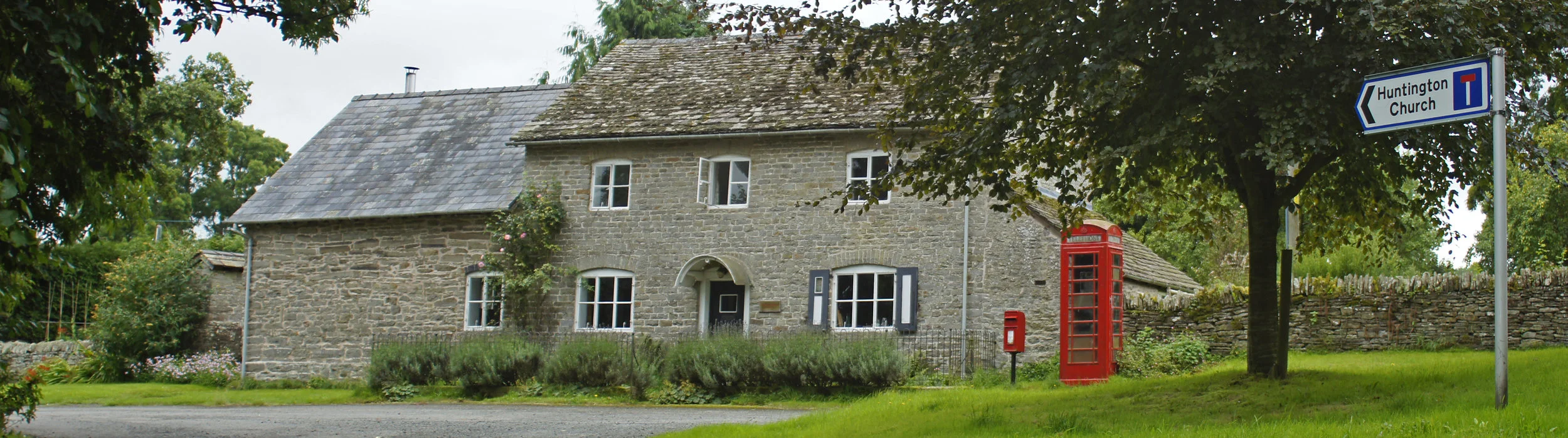 The Old Post Office and formally 'The Wych' pub, so called after a wych-elm tree that grew on the triangular sward in front of the building