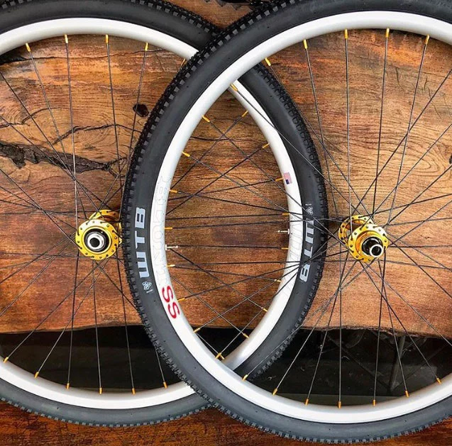 Onyx Racing Products custom hubs with Paceline 7075 gold nipples & Velocity Blunt SS rims