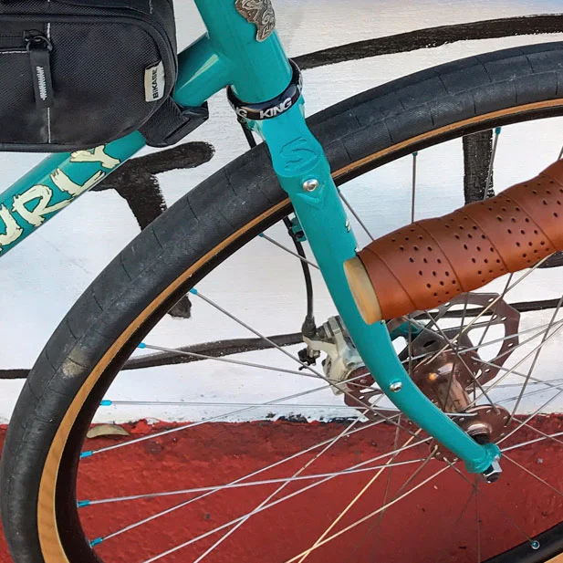 Surly Jim Brown disc hubs with Paceline 7075 aqua nipples & Sun Ringle rims