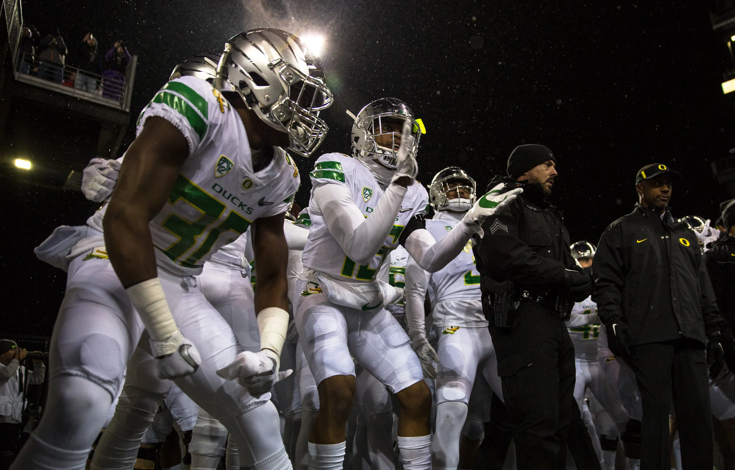 The Oregon Ducks prepare to take the field at Husky Stadium. The Oregon Ducks are trailing the Washington Huskies 3 - 17 at halftime. The Huskies rallied with a 17-point second quarter after a slow first quarter on a cold and rainy night in Seattle, Washington. 