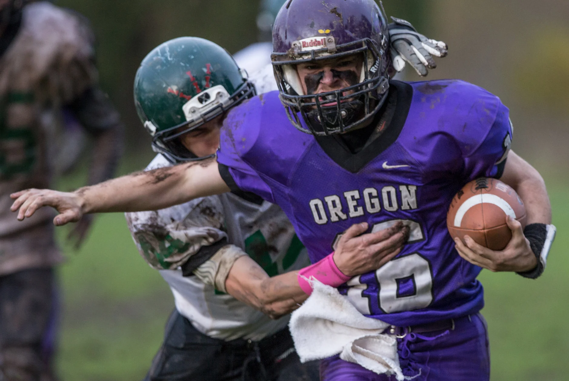 Oregon School for the Deaf junior Hunter Lively (#16) shakes off a Jewell defender. Oregon School for the Deaf defeated Jewell 48-19.