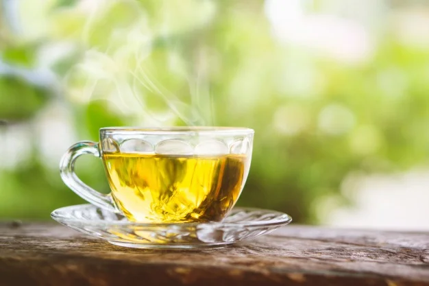 hot-tea-cup-wooden-table-morning_34670-346.jpg