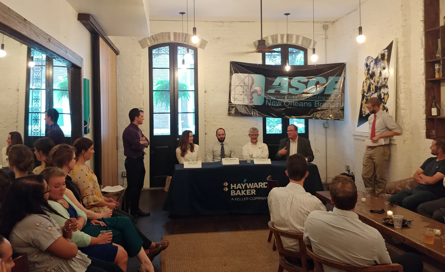 Panelists discussing engineers' role in construction