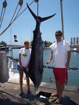 John, his wife Paula, and her first blue marlin in Mazatlan