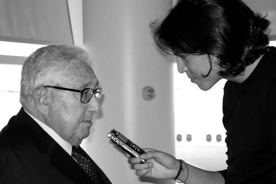 August, 2008. Mr. Senior interviews Henry Kissinger on their way to the Beijing Olympics.
