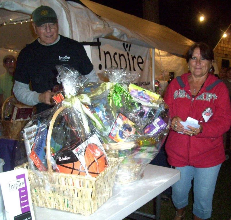 Mr. Jim Loomis lending a helping hand at the basket raffle