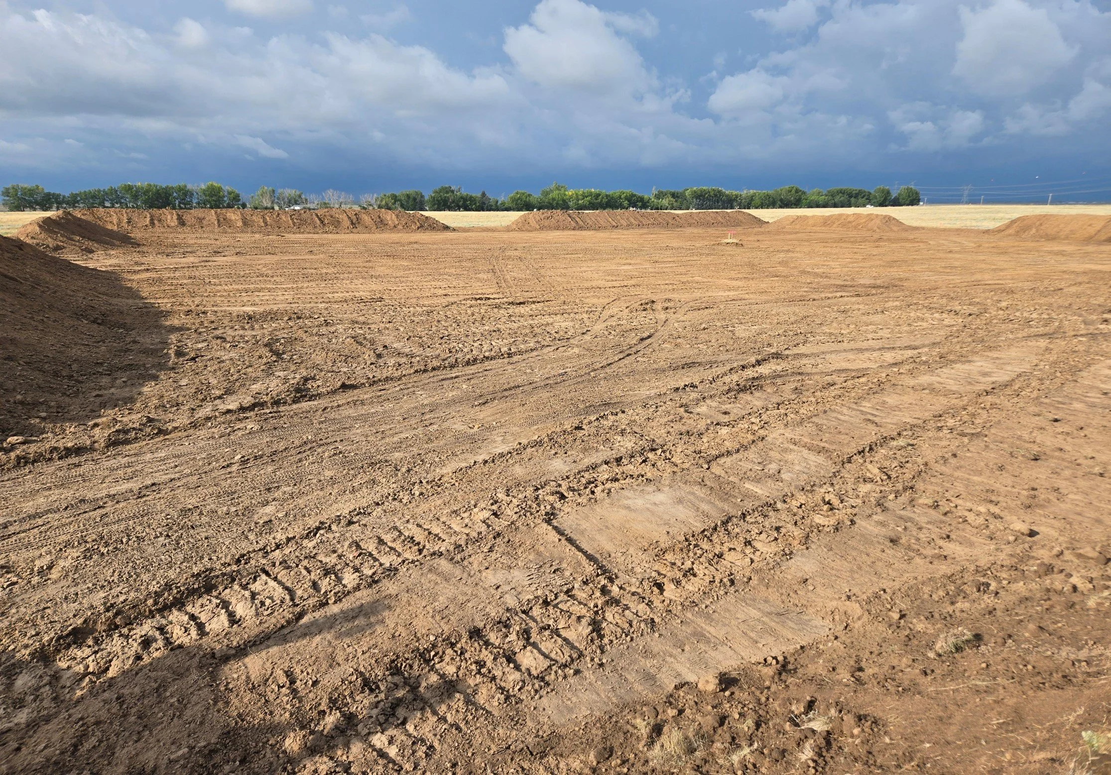Countess Well site preparation, circa August 2025: View north over lease prior to cutting grade