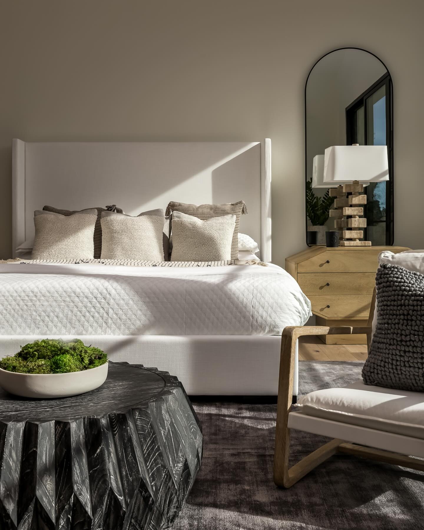 Soft textures, warm wood tones, and perfect natural light&mdash;this bedroom feels effortlessly inviting. The late afternoon sun rakes across the bed, adding depth and dimension to the space. Thoughtful design meets perfect lighting.

#InteriorPhotog