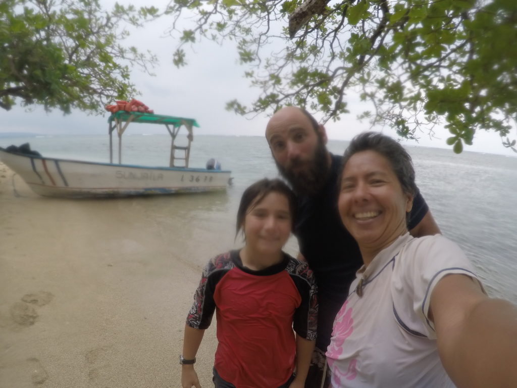 We survived our three-hour snorkeling tour unscathed. Coconut, noticeably absent from this photo, was the only casualty.