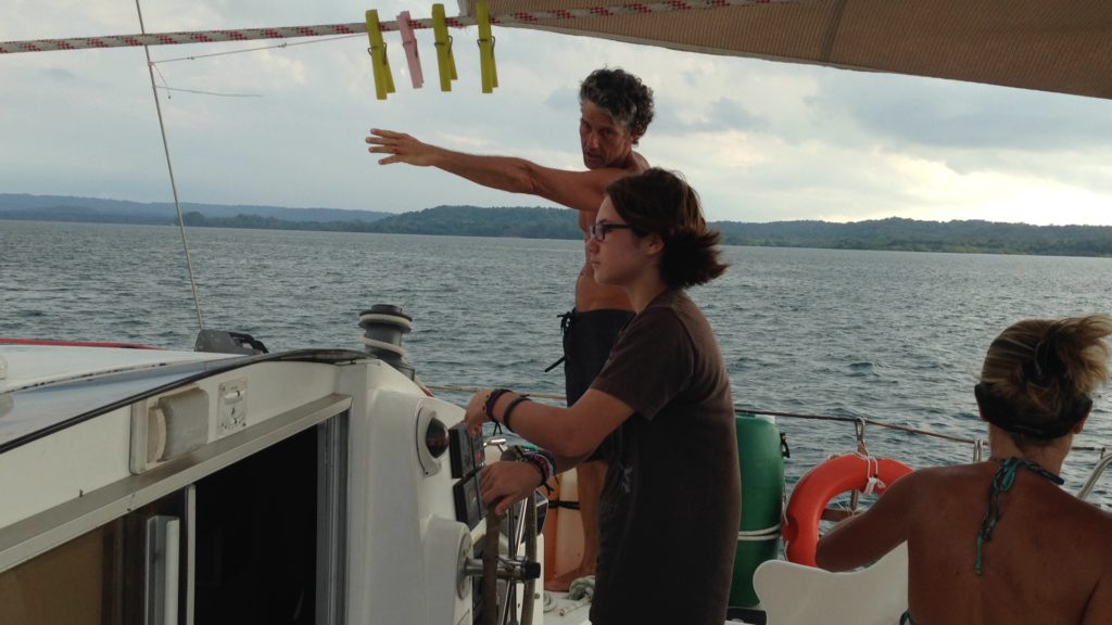 Captain Sandro directs Coconut towards the first set of locks