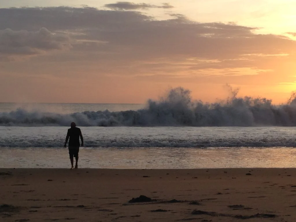 I contemplate life back in the office while waves crash behind me.