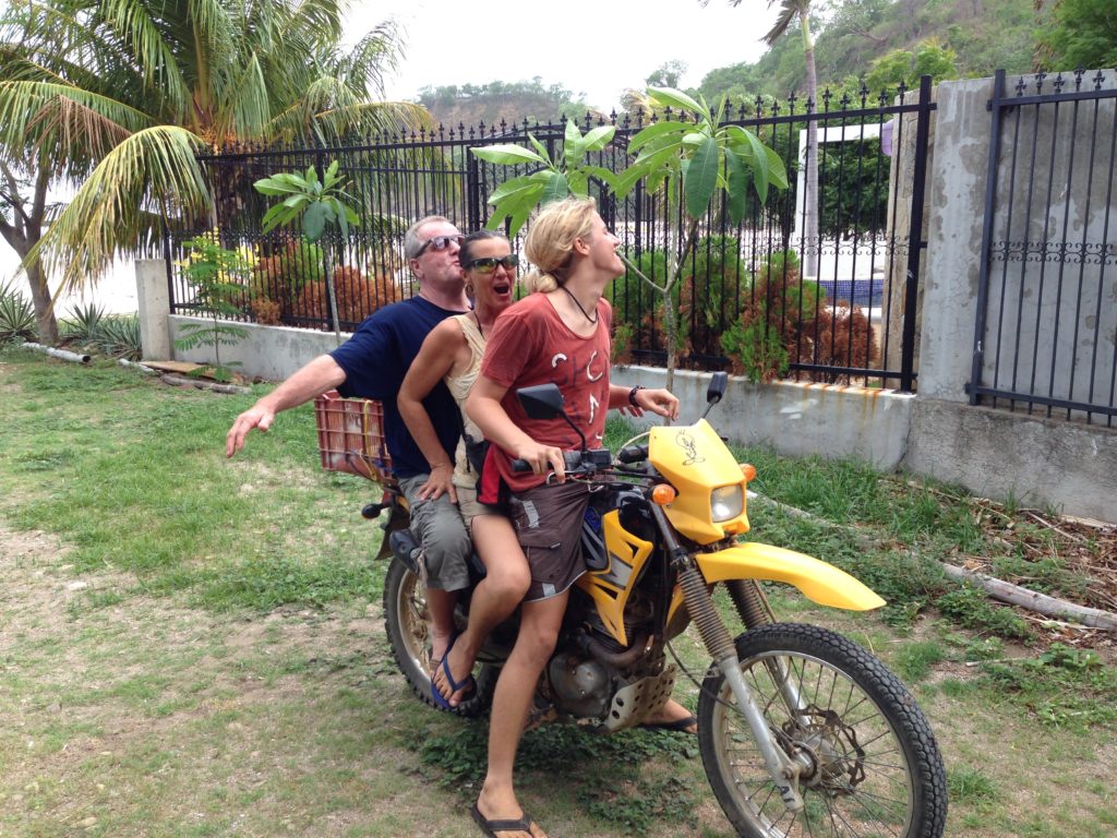 Paul, Charlie, and their oldest son, giving them a ride into town.