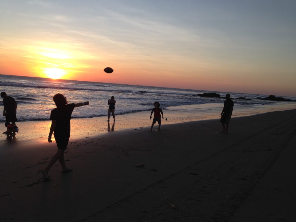 Sunset football is a good way to have fun on the beach