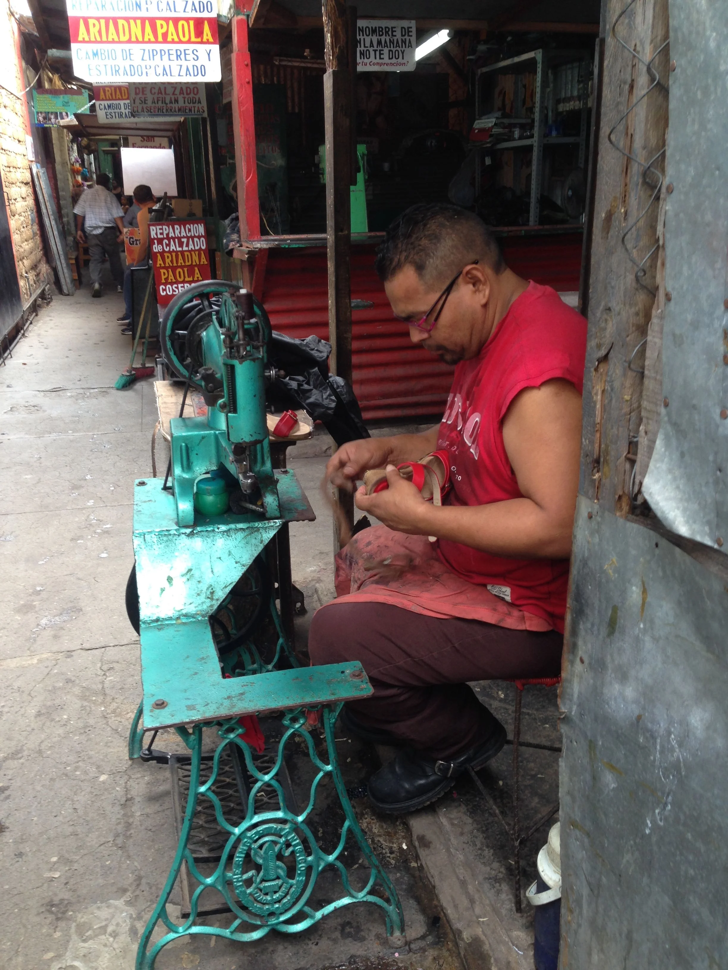 Not only was it fascinating to see dozens of men sitting at sewing machines, but they were manual machines with foot pedals.