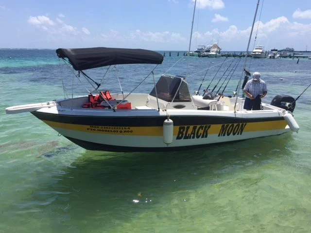 The Black Moon was the newest vessel on the pier, equipped for trolling, bouts of Montezuma's revenge, and a fighting chair, for hauling in the huge deep sea monsters.