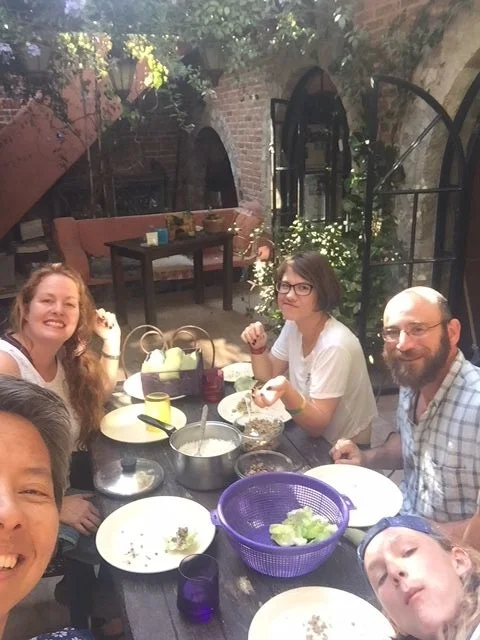 Pot luck dinner with friends on our patio. We were having so much fun we ate the other side of R's face.