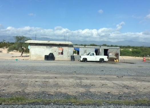 A homestead along the toll road in Northern Mexico. Prosperous or desperate?