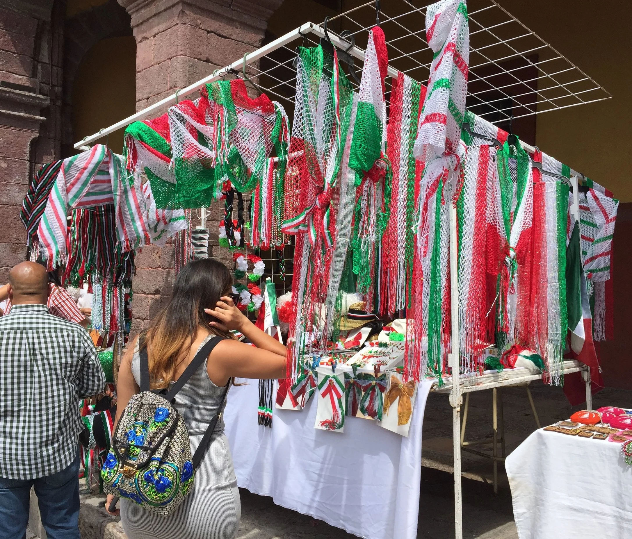 Many stands selling Mexican-flag themed trinkets pop-up around town on dates important to Mexican independence