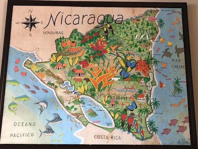 We remembered Nicarragua as shiny and happy, like this wall art hanging in a fancy gringo resort . . .