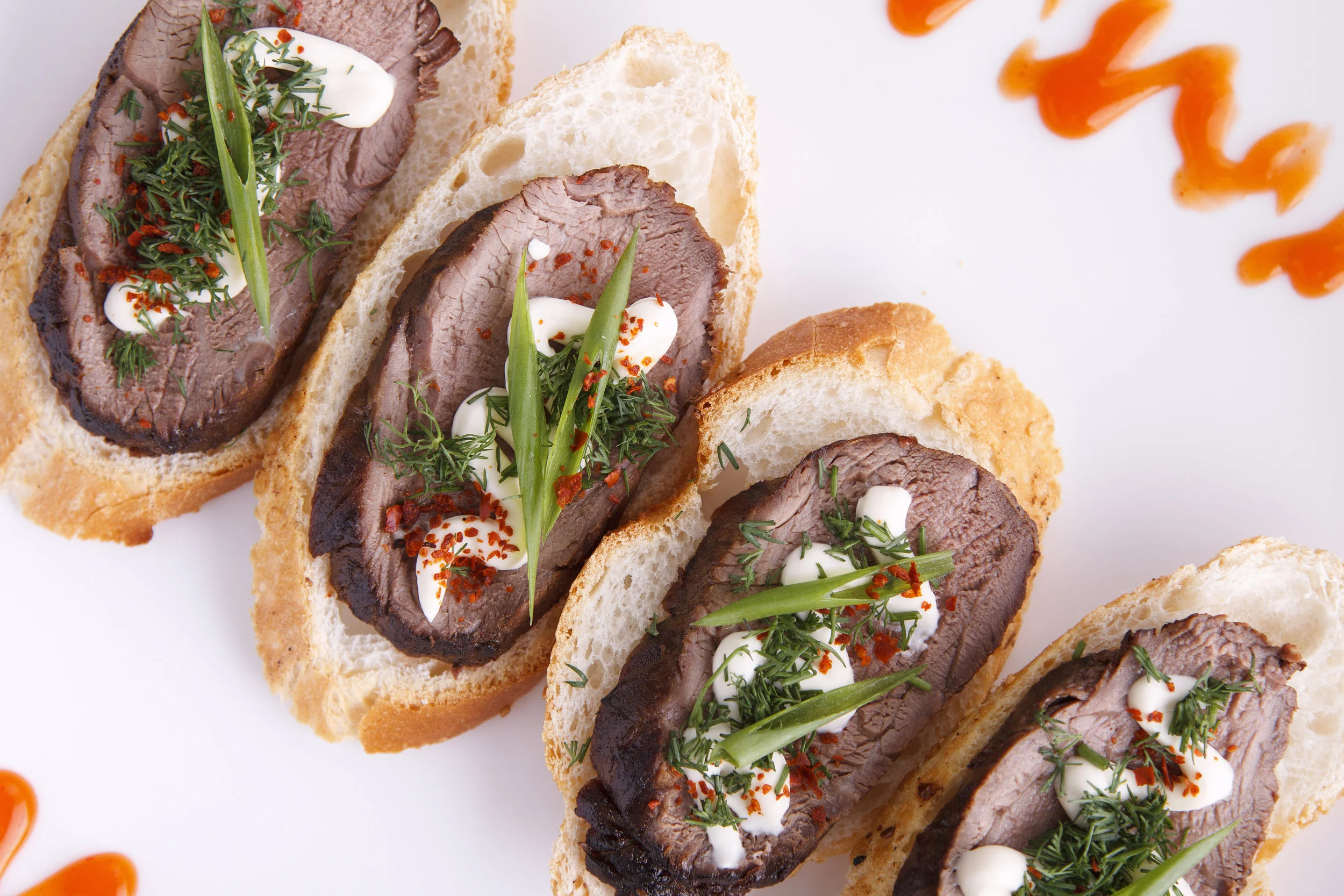 Sliced Tenderloin Crostini