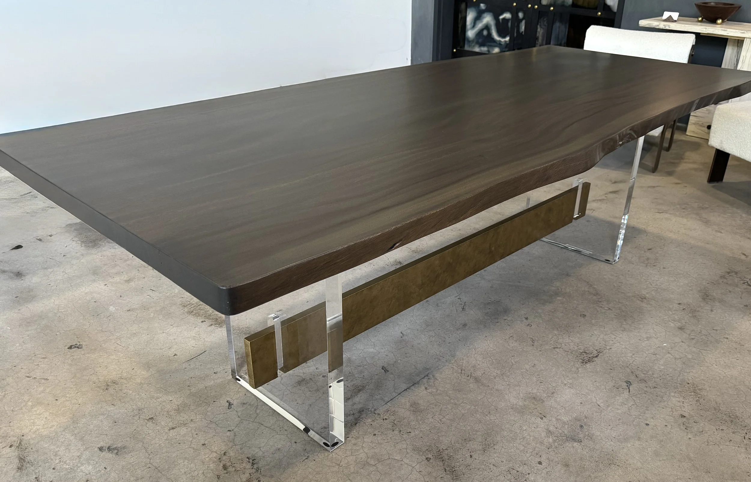 Monkeypod slab with acrylic legs and brass stretcher 