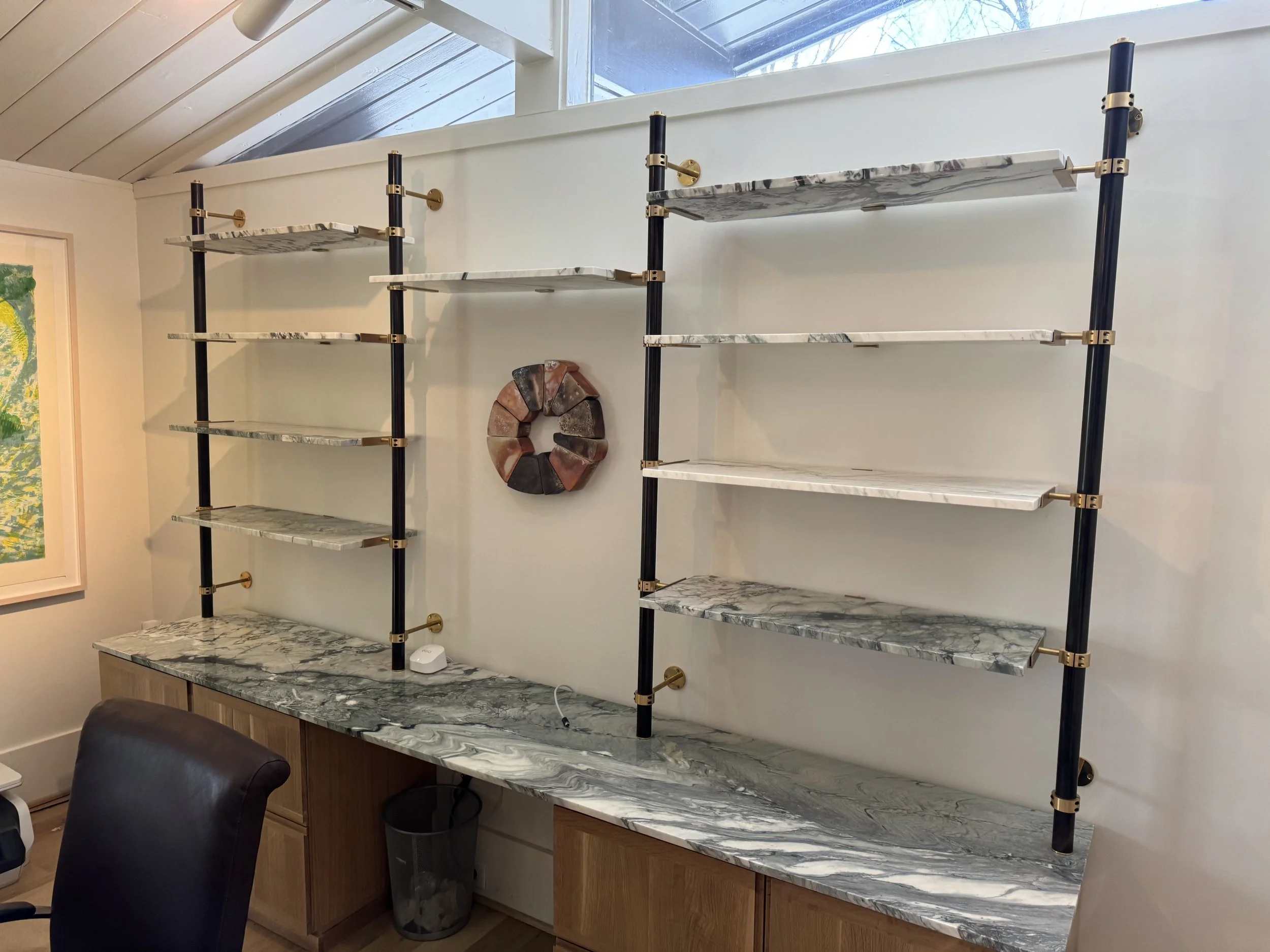 Machined Brass Collar shelving with marble shelves