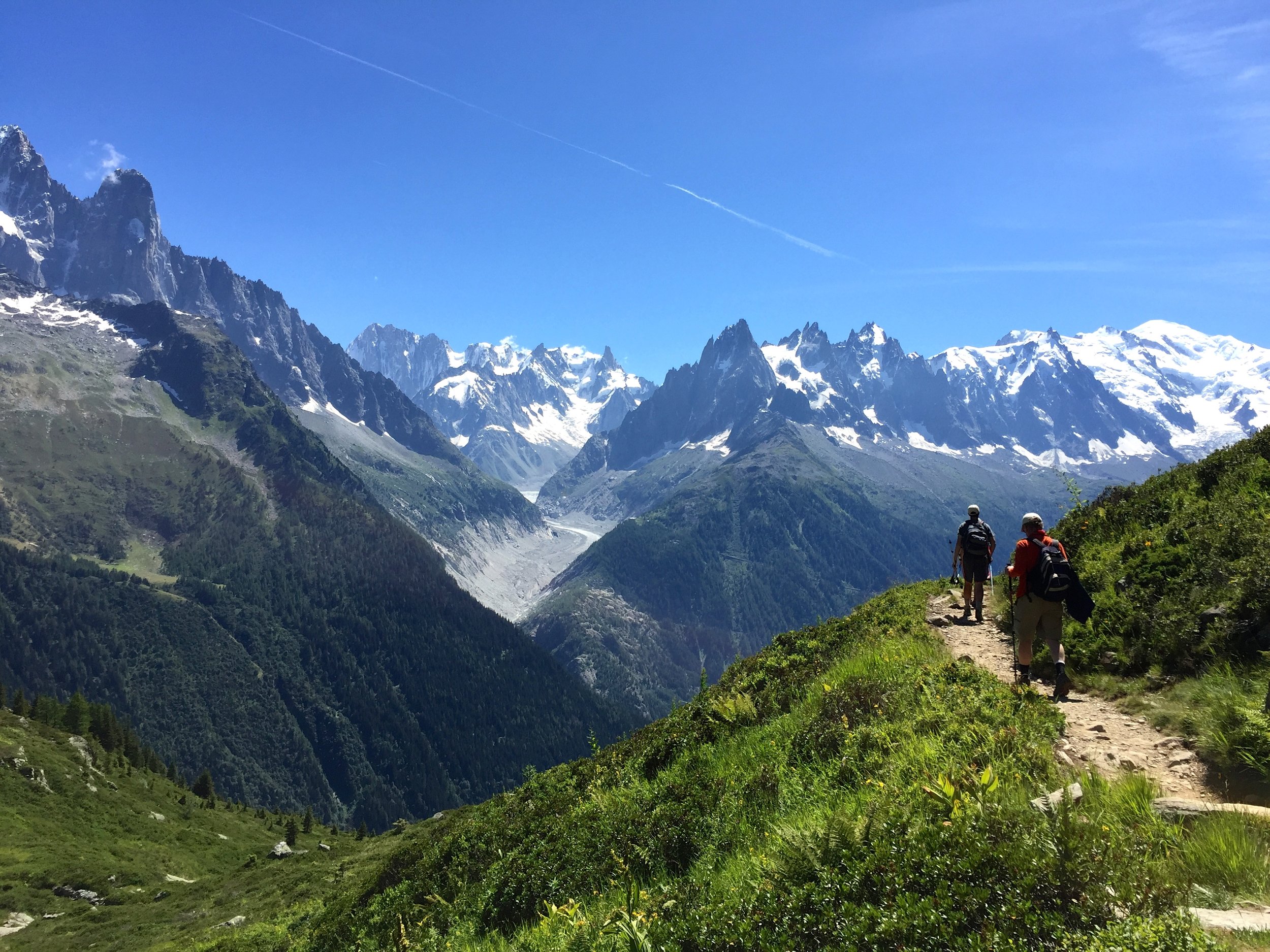 The last day on the tour, we hike back into the Chamonix Valley, you can see the Needles ahead and Mont Blanc peeking on the right.