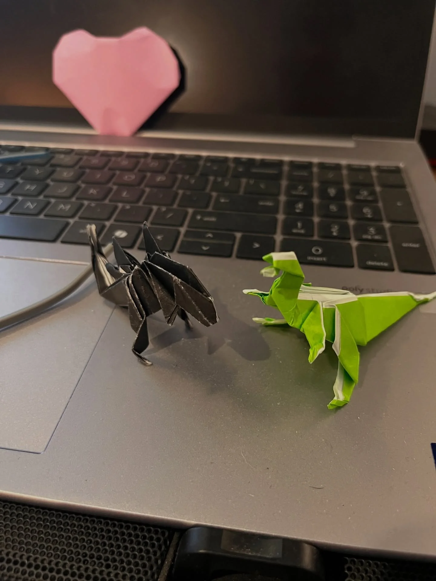More than just &ldquo;online&rdquo; 🌈

At Online is Easy, we&rsquo;re all about making the digital world feel a bit more human.

Case in point: my desk today. I opened my laptop to find a pink heart, a dragon, and a dinosaur - followed by a rhino ar