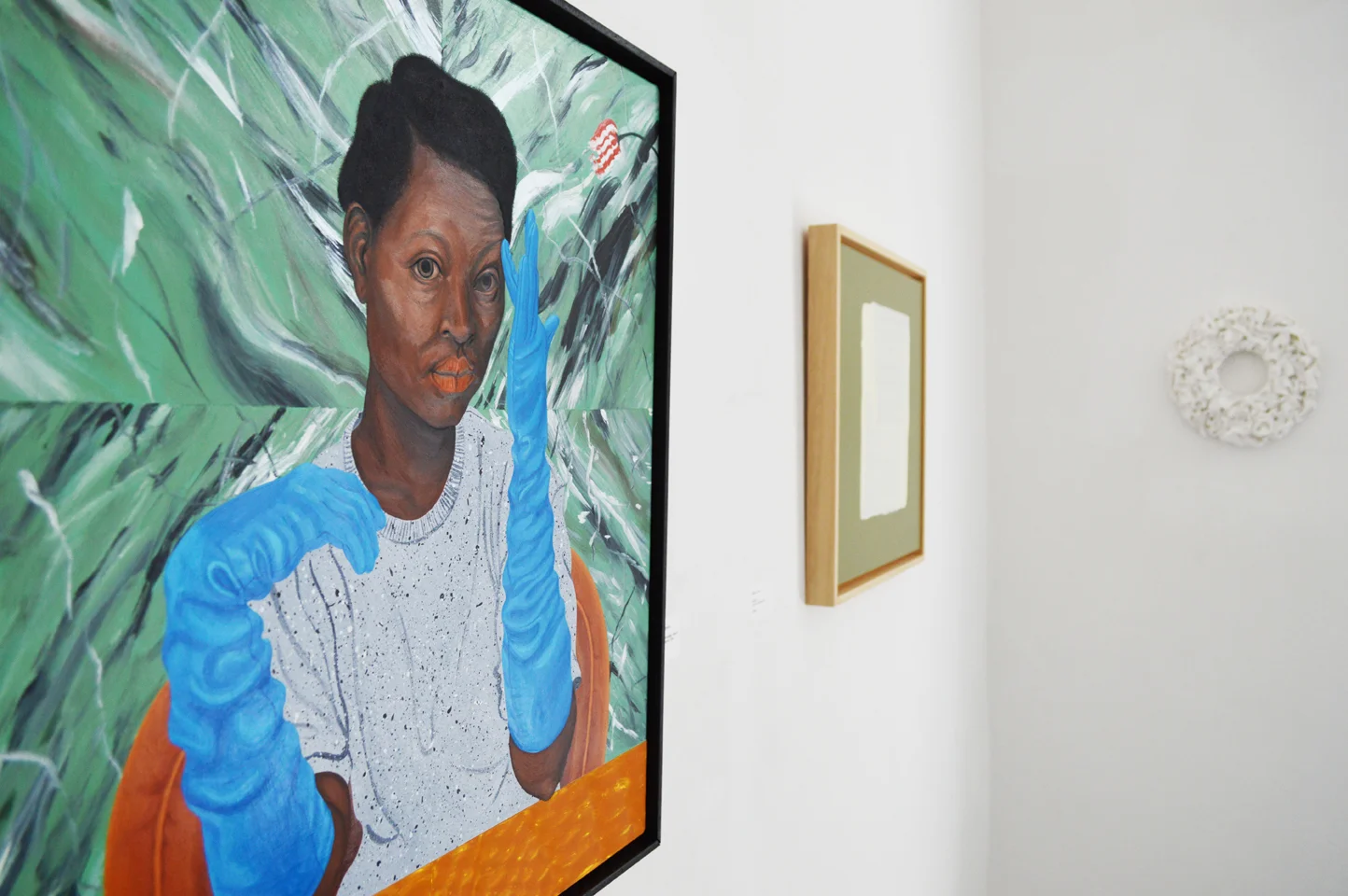 seren morgan jones, blue gloves, orange chair
