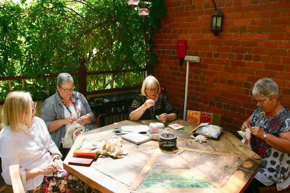 Sewing in the sun at The Eaglehawk Hotel Maldon