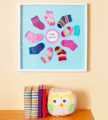 Baby Sock Keepsake ~ Photograph by Peter LaMastro