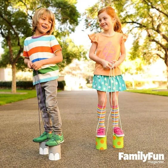 Painted Can Stilts ~ Photograph by Sabrina Helas