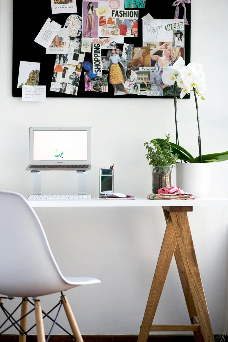Here's a picture of my office space with my inspiration board above my desk. I have a pin board so I can change the pictures at anytime. 